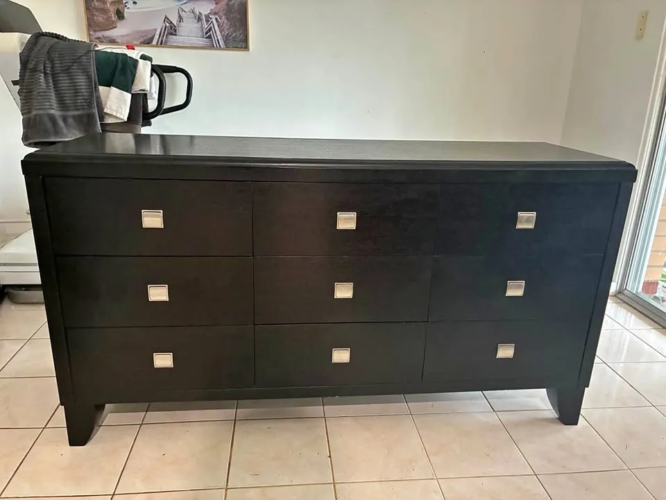 Garage sale in Rockingham WA: black dresser, ping pong table and trampoline