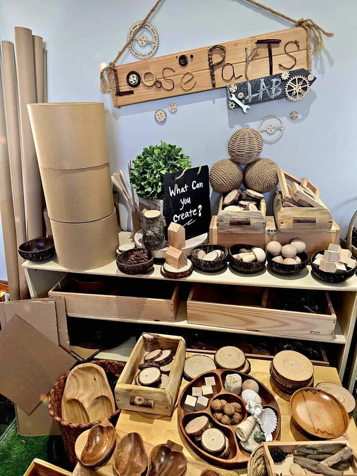 Garage sale in Clyde North VIC: pine cones, bamboo cups, wood rounds and books