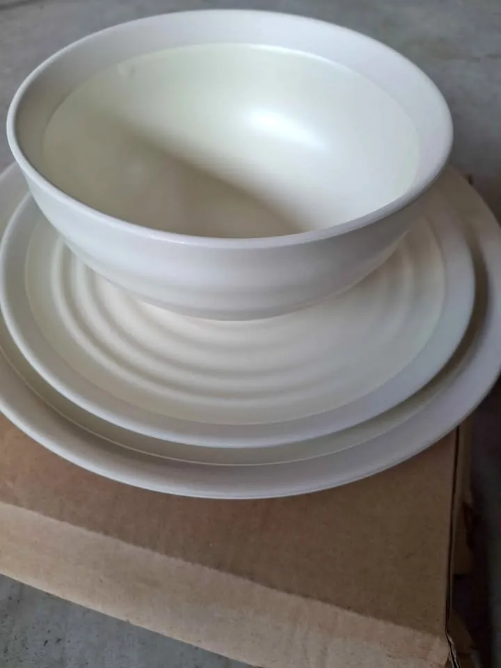 Garage sale in Boronia VIC: assorted household items, tiles, toys and plants