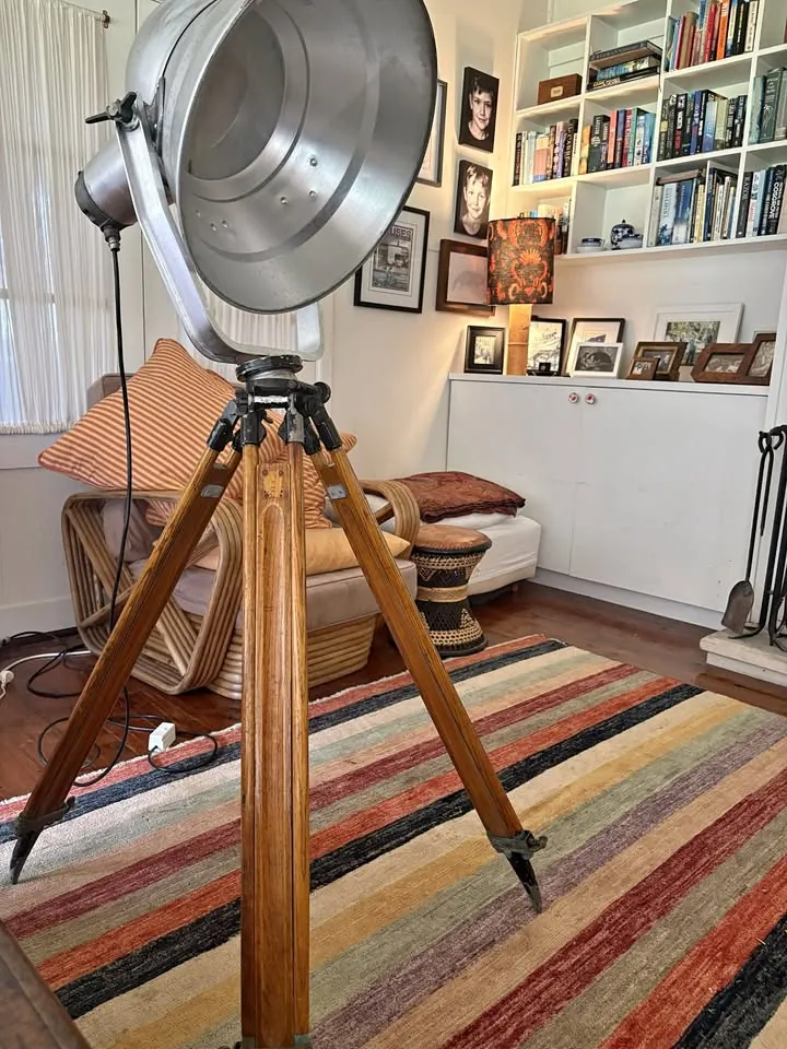 Vintage garage sale in Patonga NSW with cane furniture, lamps and collectables