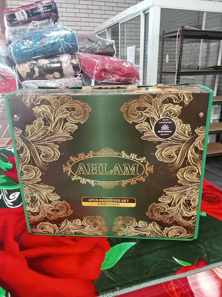 Garage sale in Beckenham WA with rugs and blankets